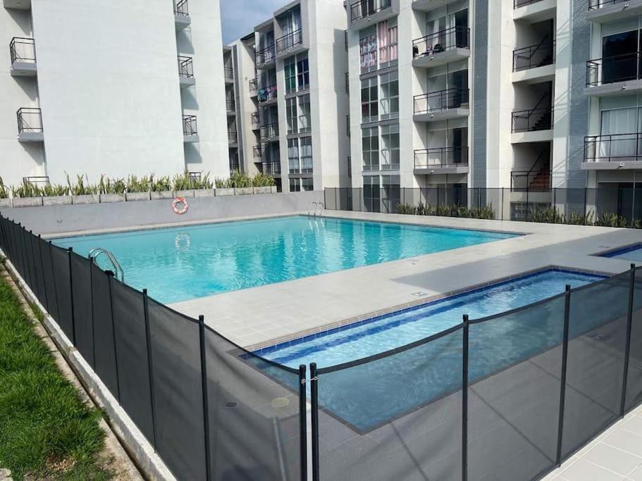 Apto amoblado Melgar con Piscina