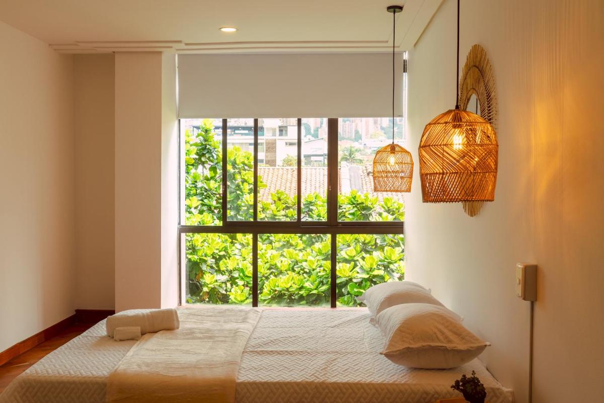 Elegante habitación baño compartido en Poblado -B11
